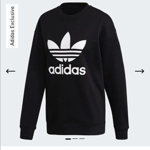 Women’s black and white Adidas sweatshirt only worn twice. Sized medium.